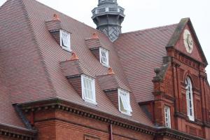 Reroof of Mckee Army Barracks in Dublin with country brown tiles